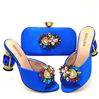 Trendi proizvode talijanskog dizajna, jednostavan i elegantan, raznobojnim dijamanata, ženske cipele plave boje i večernje vjenčanje torbe